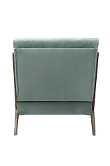 Низкое кресло с деревянными подлокотниками Mody Green в интерьере в Краснодаре